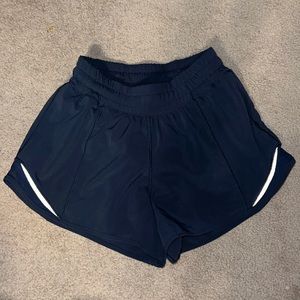 Lululemon hotty hot low rise 4 inch shorts. Navy blue